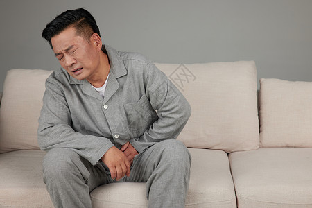 临床症状居家中年男子肚子痛背景