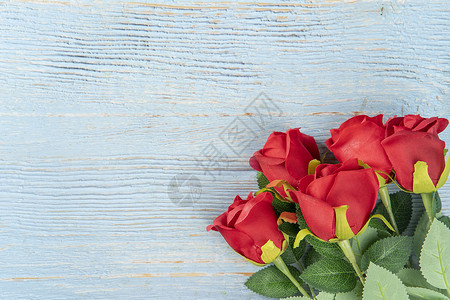 情人节花草桌上摆拍的玫瑰花背景