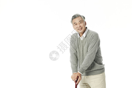 老年男性拄着拐杖形象图片