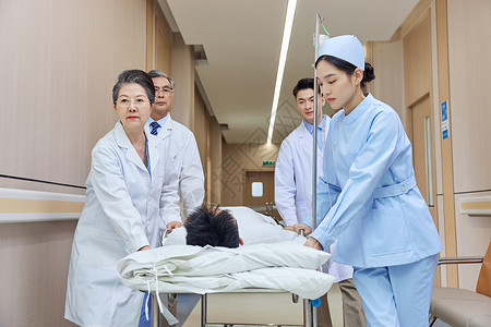 医院走廊医护人员抢救病患背景图片