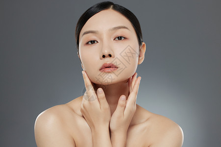 女性美妆护肤面部带手部展示高清图片