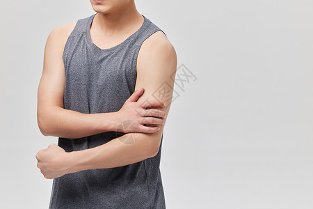 运动手臂运动青年手部肌肉酸痛背景