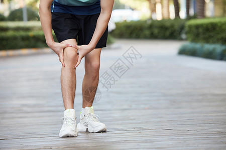 健身男性膝盖受伤局部特写高清图片