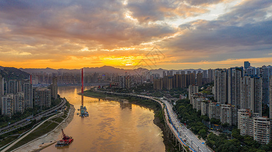 重庆两江夜游夕阳下的重庆两江交汇两岸背景