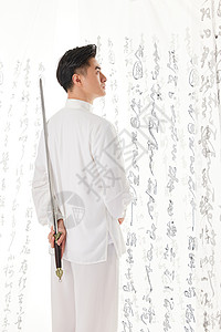 拿着剑的中国风男性形象图片