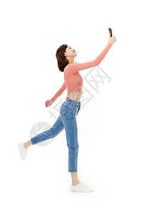 奔跑的4G手机拿手机起舞的活力少女背景