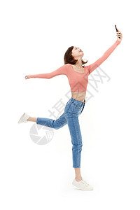 奔跑的4G手机拿手机起舞的活力少女背景