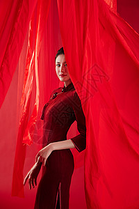 中国风红色飘带被红色飘带包围的旗袍美女形象背景