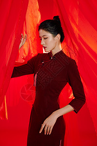中国风红色飘带红色飘带背景中的旗袍美女形象背景