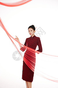 国民风旗袍红色飘带背景中的旗袍美女形象背景