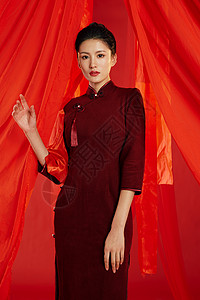 中国风红色飘带红色飘带背景中的旗袍美女形象背景