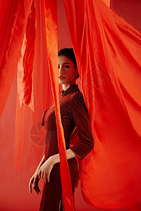 端庄舞者红色飘带背景中的旗袍美女形象背景
