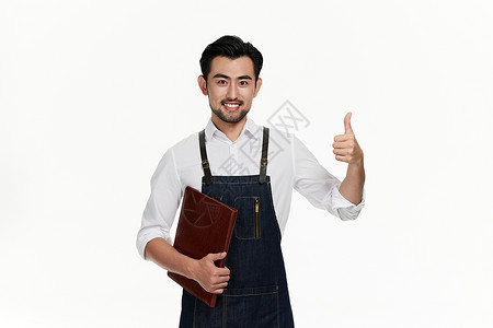 男性咖啡师拿着菜单竖大拇指背景图片