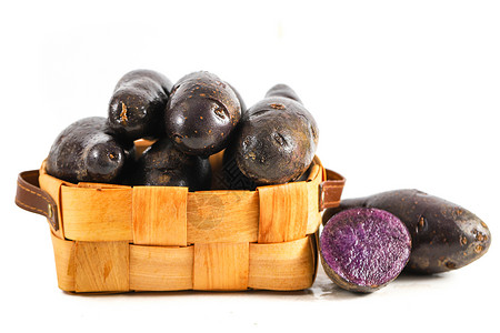紫色土豆黑色马铃薯黑茄子高清图片