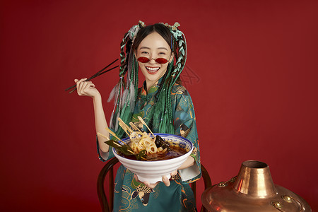 吃火锅的国潮美女形象背景图片