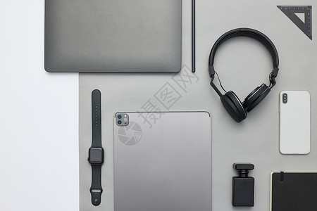 平铺数码产品灰色里的电子产品背景