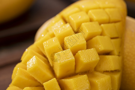 整个芒果和切块芒果组合芒果切块特写背景