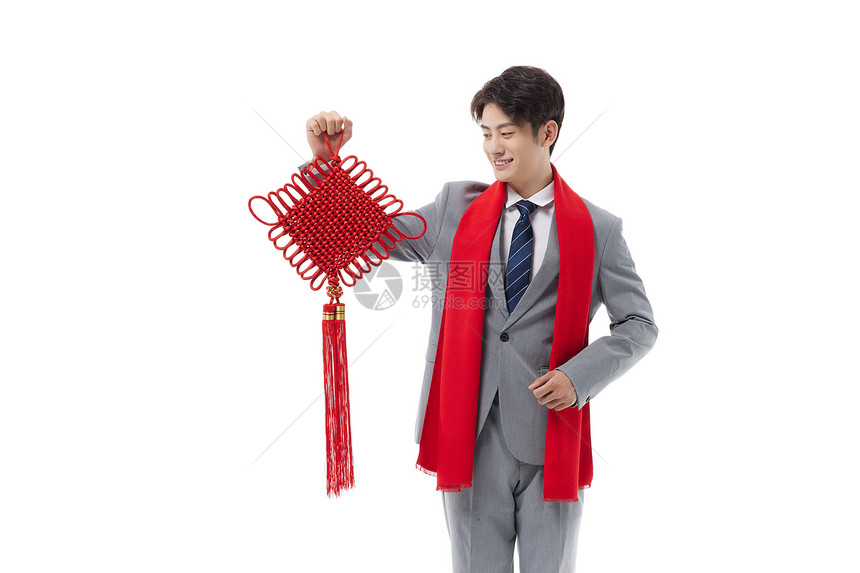 商务男性迎春节拿中国结图片