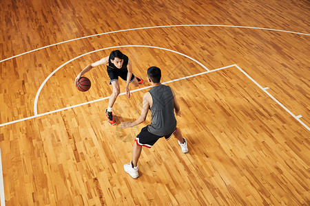 篮球选手打篮球对抗单挑背景图片