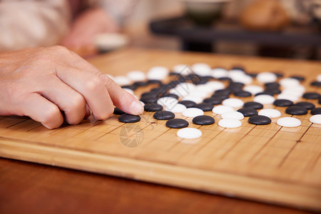 老年棋下围棋特写背景