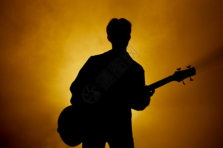 弹吉他歌手男性歌手唱歌弹乐器轮廓剪影背景