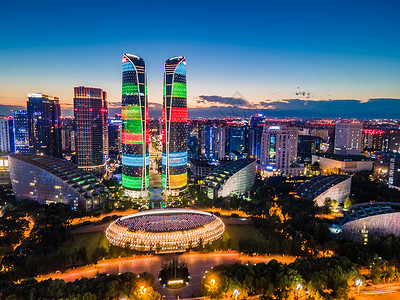 国庆焕新周航拍成都新地标交子之环与金融城双子塔夜景背景