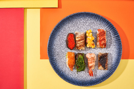 色彩撞色寿司拼盘背景图片