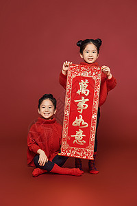 新年春节双胞胎女孩拜年作揖背景图片