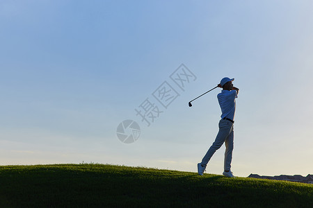 运动球剪影粒子打高尔夫的男性剪影背景