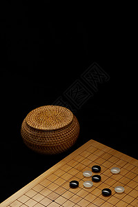 五子棋棋盘围棋盘上的黑白棋子背景