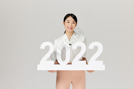 美女欢乐迎接新年2022背景图片