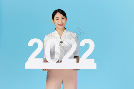 美女欢乐迎接新年2022背景图片