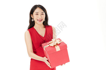 美女欢乐迎接新年手拿礼物盒背景图片