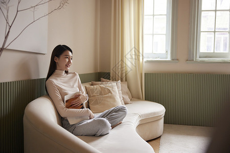 慵懒女孩年轻优雅美女居家生活背景