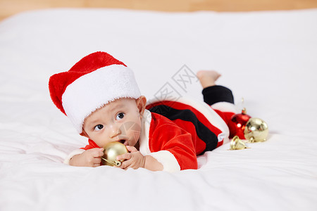 圣诞节儿童圣诞装扮的可爱宝宝背景
