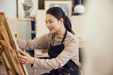 手绘相框素材在画室画石膏像的女学生背景