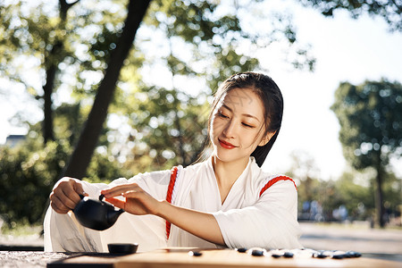 饮茶下棋的神明少女图片