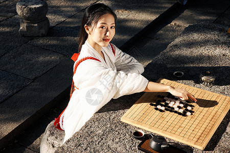 古风棋盘素材户外下棋的古风气质围棋少女背景