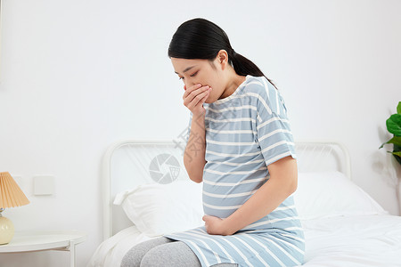 年轻孕妇孕期不良反应孕吐背景图片