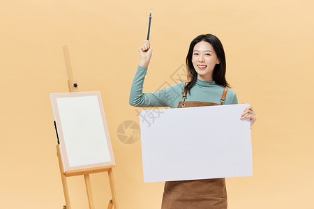 合成艺术画画的女性手拿白板背景