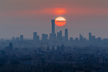 北京清晨北京国贸的日出背景