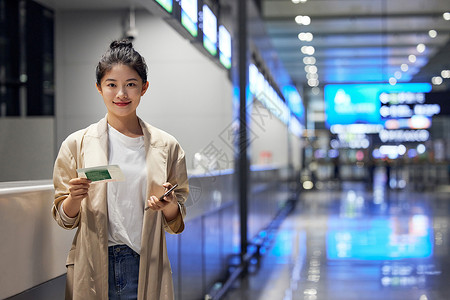 南京禄口机场在机场办理登记手续的女生背景