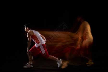 男性打篮球运动轨迹高清图片
