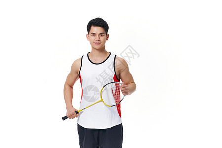 打羽毛球的青年男性形象图片
