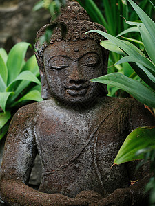 花园雕像靠近花园的佛像背景