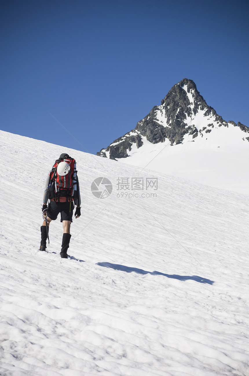 美国华盛顿北卡斯德公园Shuksan山上攀登硫化冰川的人图片