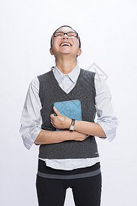 女商人抱平板电脑仰头笑背景图片