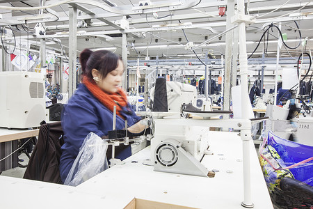 裁缝场的工作的女人工业高清图片素材