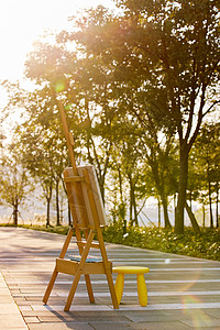 美术写生公园里的画架背景