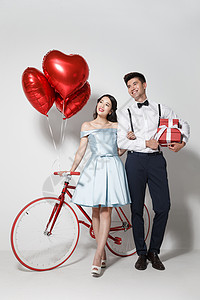 购物庆典浪漫情侣骑自行车背景